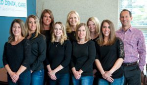 The Advance Dental Care of Anderson team posing for professional dental team photo