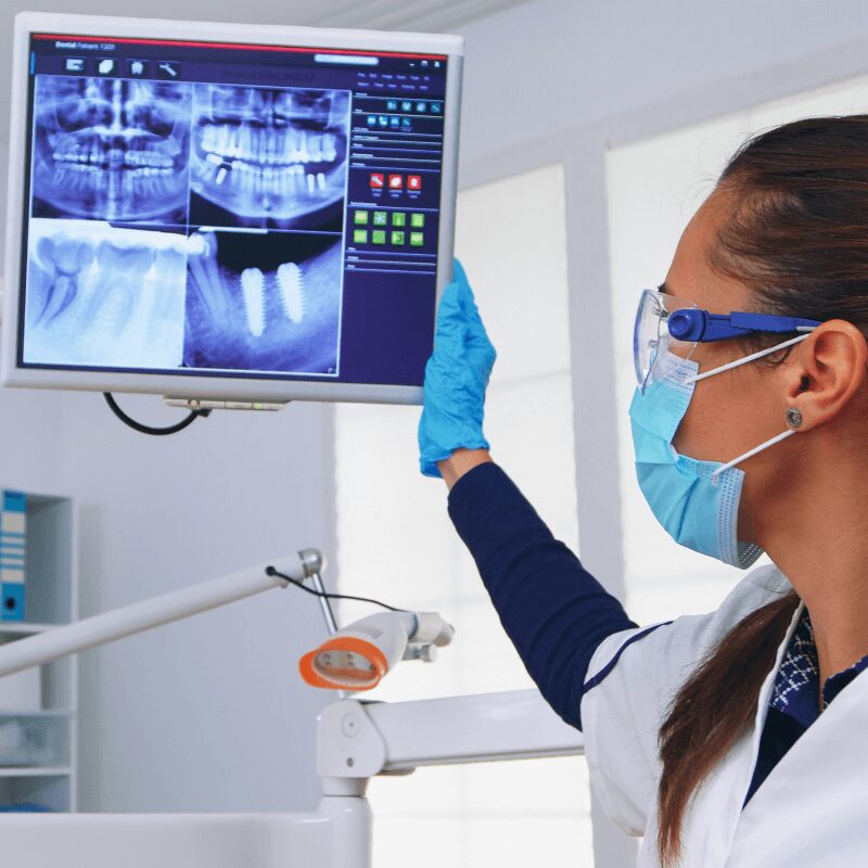 dentist-doctor-patient-looking-digital-teeh-x-ray-dental-office